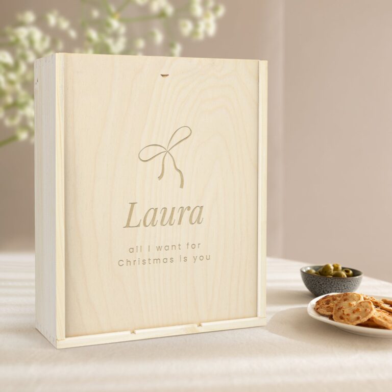 engraved wooden case with space for a bottle and 2 wine glasses